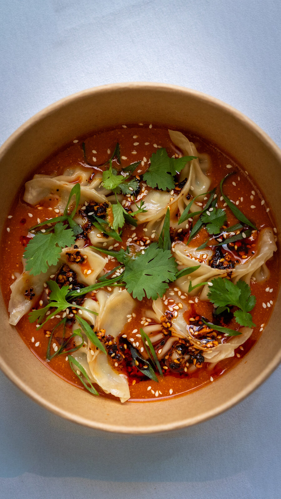 Saucy Diplomat jhol momo in a spiced sauce